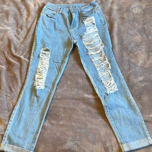 Washed ripped blue jeans